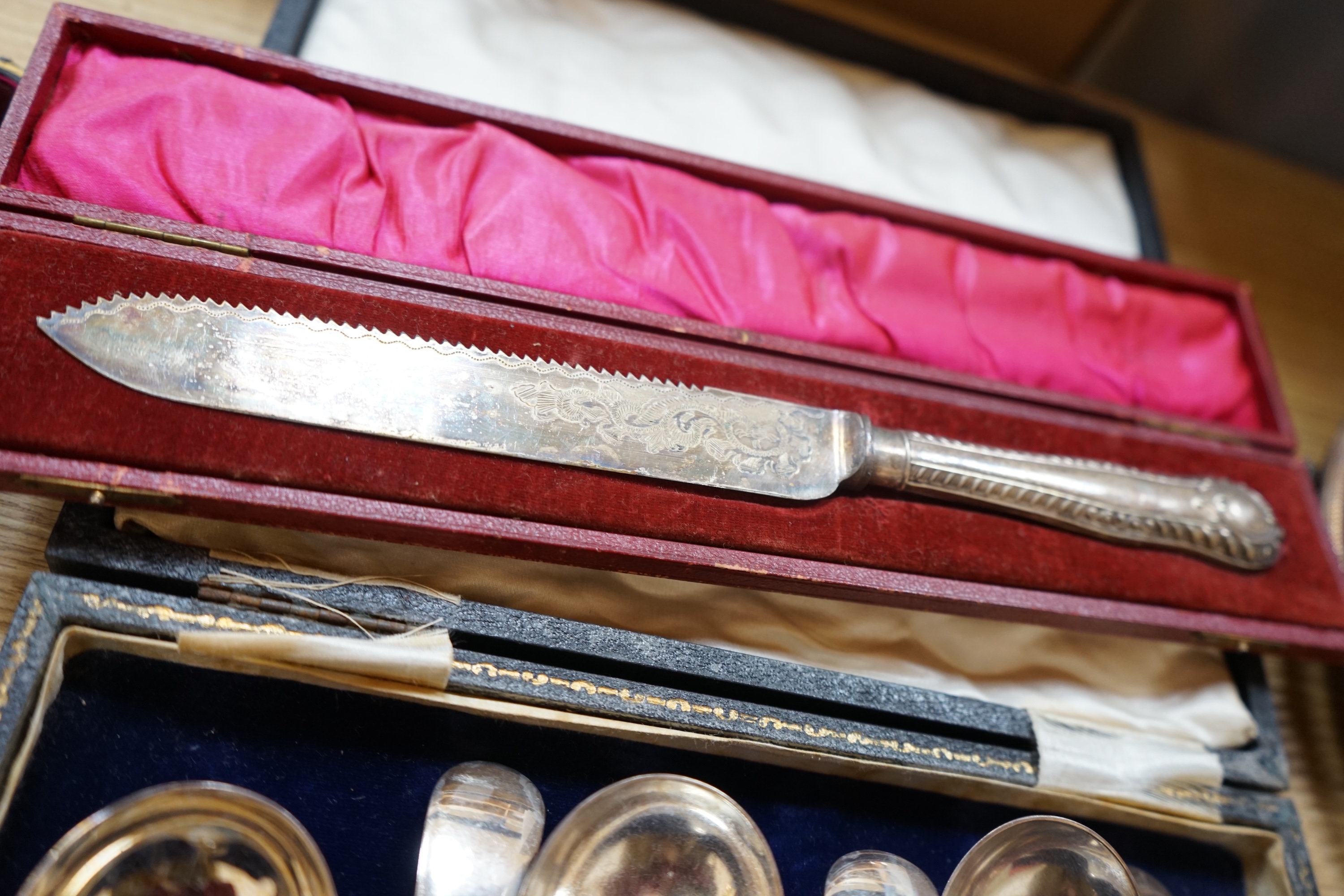 A cased silver mounted and antler handled carving set, plated cutlery, badges, chain, napkin ring etc, carving knife 38cm long. Condition carving set good, the rest variable